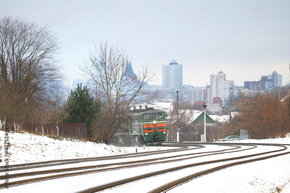 Fototapeta premium freight train passing through a railway crossing