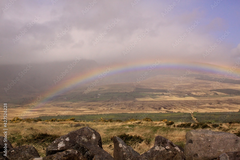 Misty Rainbow over Irish countryside Misty Rainbow over Irish countryside