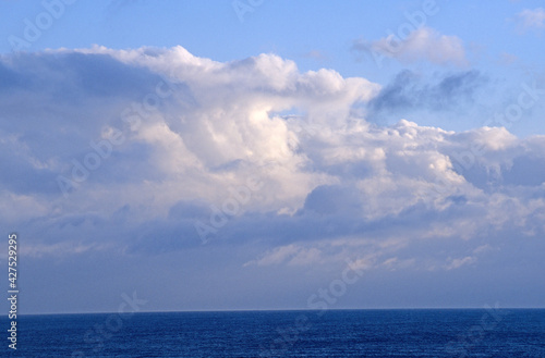 Cloud massing over the ocean. Late afternoon. 