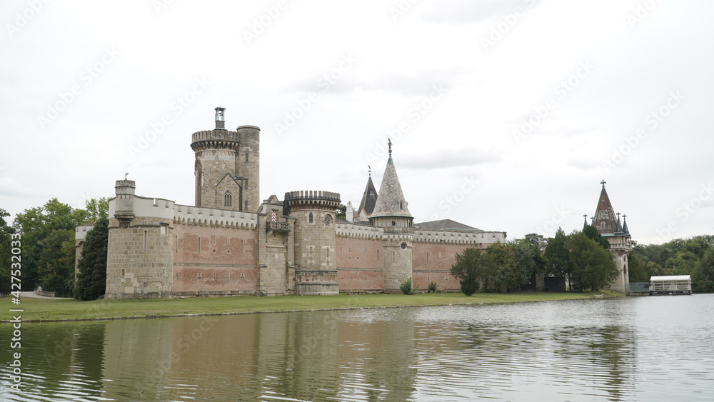 Laxenburg castle complex with lake and forest landscapes near Vienna, Austria.