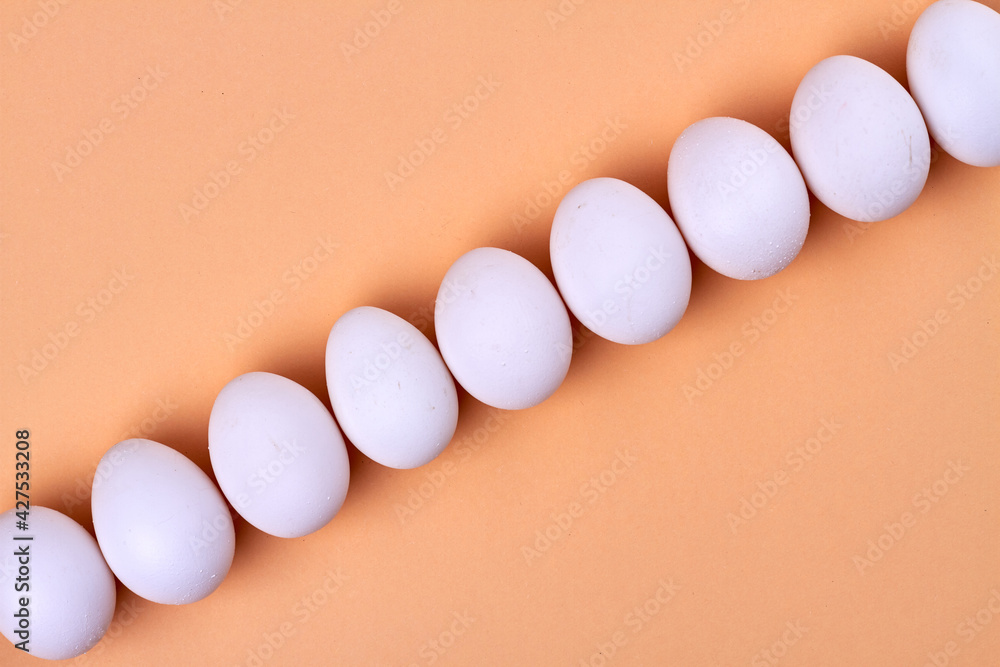Row of eggs arranged in a diagonal line. Row of eggs arranged in a diagonal line.