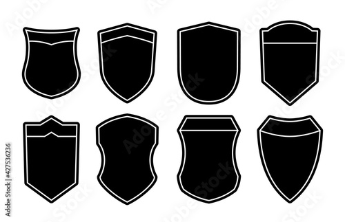 Set of blank empty dark shields. Black badge shapes. Vintage heraldic banner shapes design. Retro style borders, frames, labels