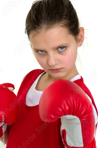 Sports boxer teenage girl, in the studio for white background.