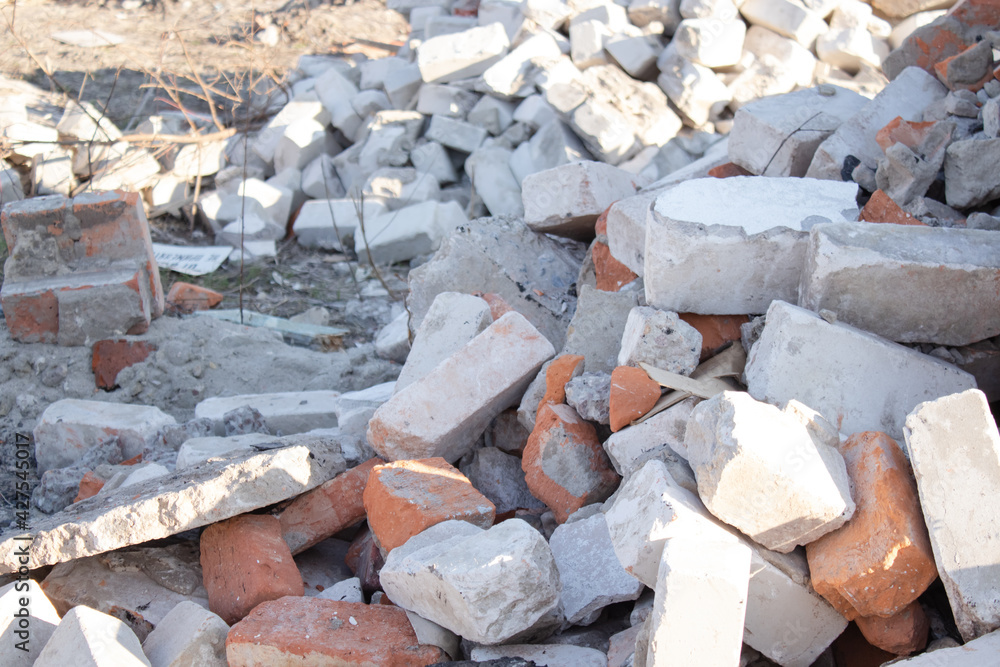 pile of old used bricks. construction of houses. background