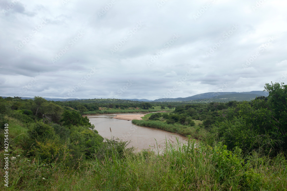 Landscape in the Hluhluwe Imfolozi Game Reserve. African safari in the park. 