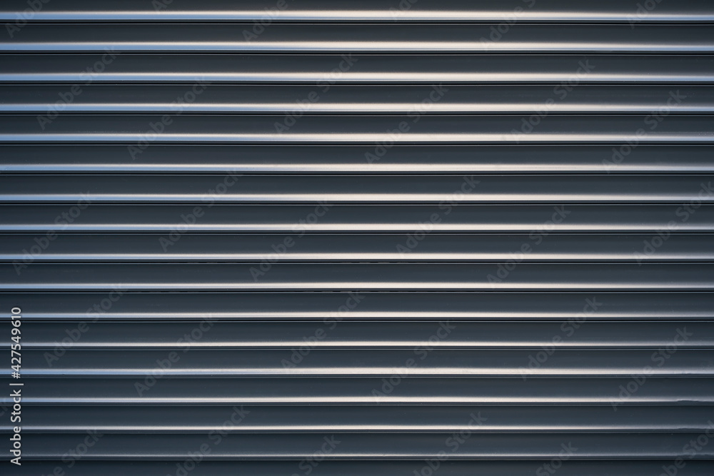 Obraz premium Metallic background. A metal surface with horizontal stripes.