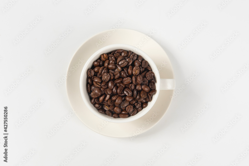 Coffee cup and coffee beans on white background Coffee cup and coffee beans on white background