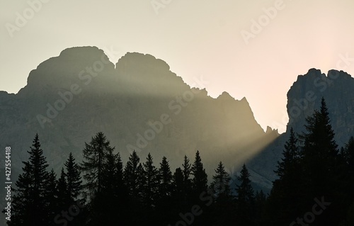 Sunrise between mountain cliffs