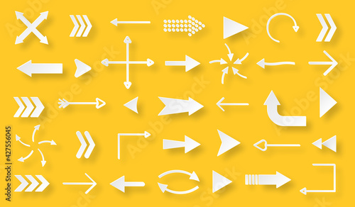 Paper cut arrow icons set isolated on yellow background. Different shape pointer collection. Simple cursor symbol for graphic design, mobile apps, web interface. Up, down, left, right direction sign