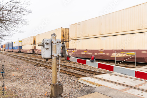 Chicago, Illinois - March 12, 2021: Cargo Train Passes Through Downers Grove in Chicago.