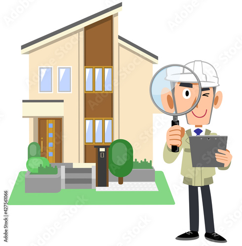 虫眼鏡と書類を手にする作業員の男性と住宅
