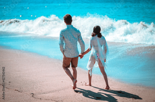 couple walking on the beach