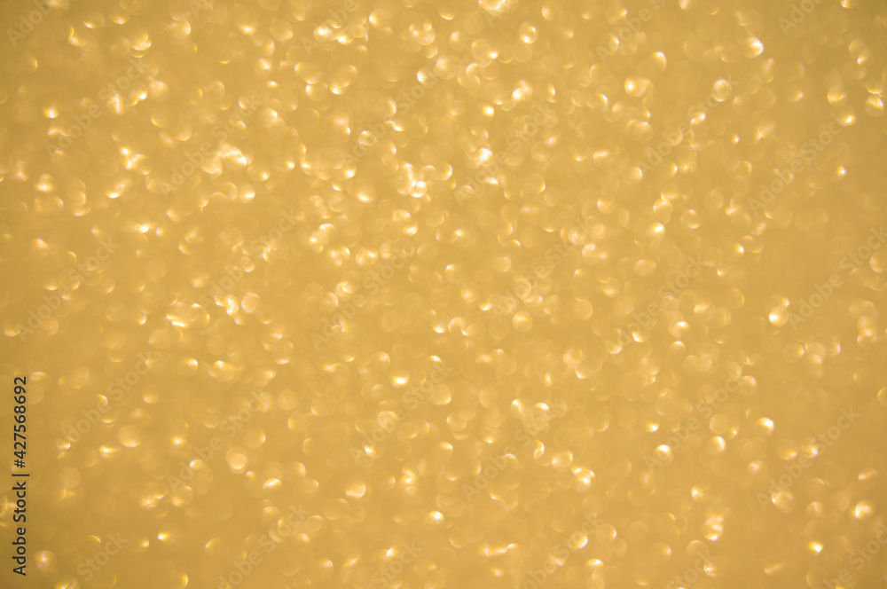 Gold glitters background. shimmering blur spot lights Bokeh Shiny gold light background. Gold glitters background. shimmering blur spot lights Bokeh Shiny gold light background.