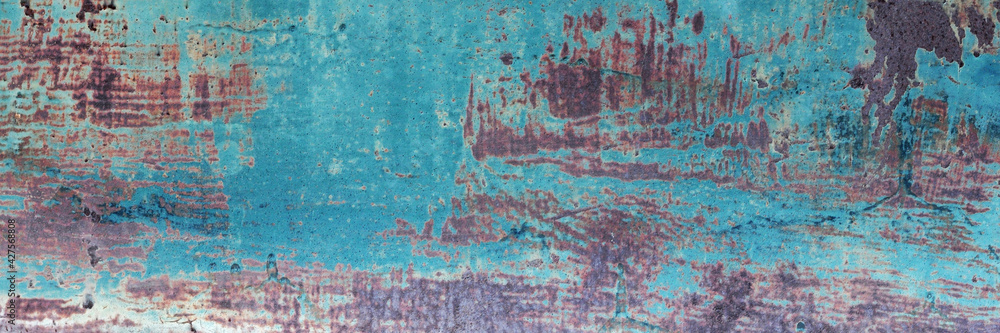 The surface of the old iron has rusted and peeled off. Rust stains on galvanized sheets. Abstract background for decorative and work design. The surface of the old iron has rusted and peeled off. Rust stains on galvanized sheets. Abstract background for decorative and work design.