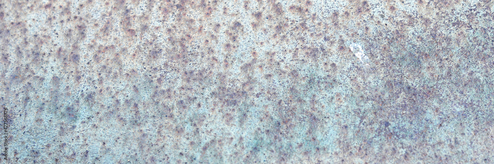 The surface of the old iron has rusted and peeled off. Rust stains on galvanized sheets. Abstract background for decorative and work design. The surface of the old iron has rusted and peeled off. Rust stains on galvanized sheets. Abstract background for decorative and work design.