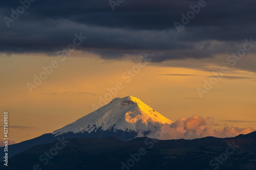 The mighty Cotopaxi volcano at sunset near Quito, Cotopaxi province, Ecuador. photo