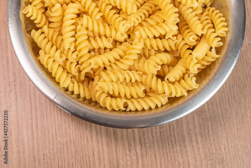 Raw pasta in bowl - macro detail