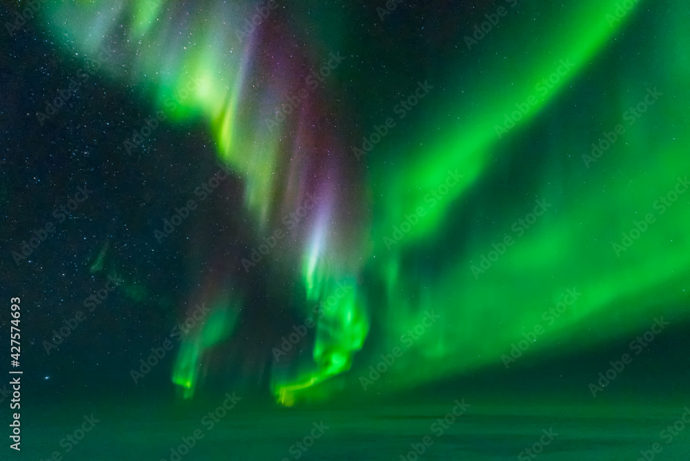 Colourful aurora display taken from an aeroplane