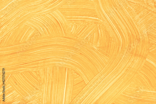 Abstract art background light orange colors. Watercolor painting on canvas with golden strokes and splash.