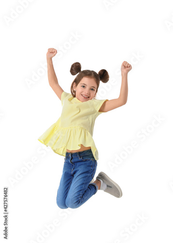 Jumping little girl on whit...