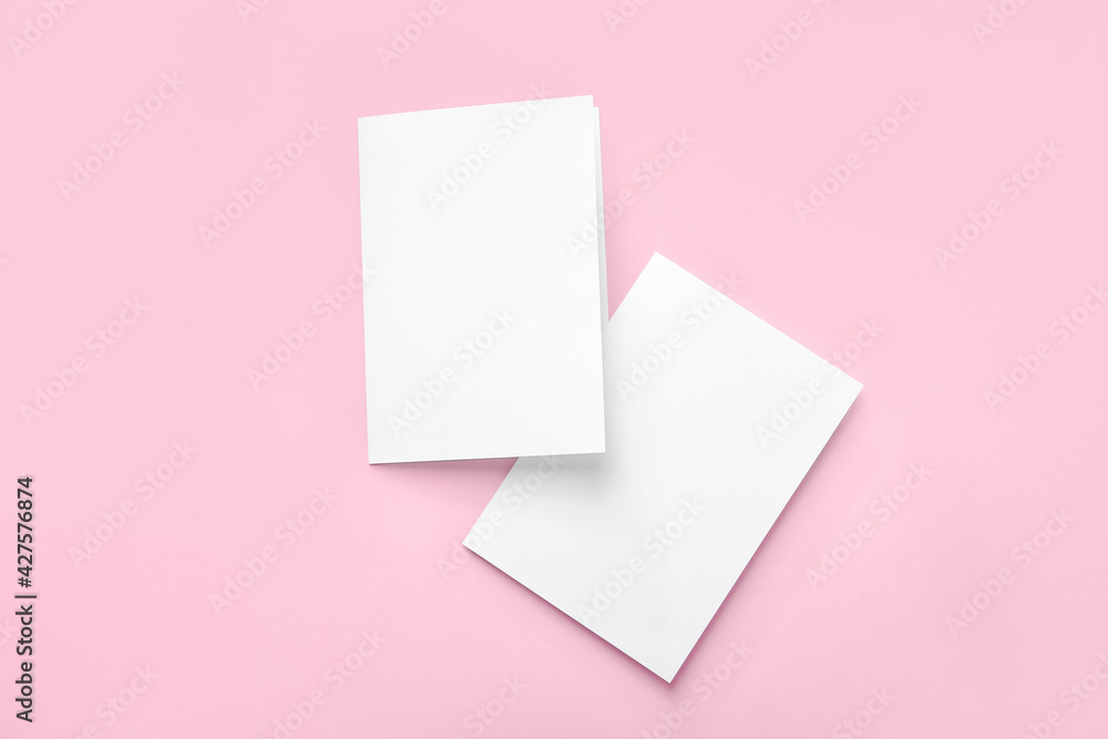 Blank brochures on color background Blank brochures on color background