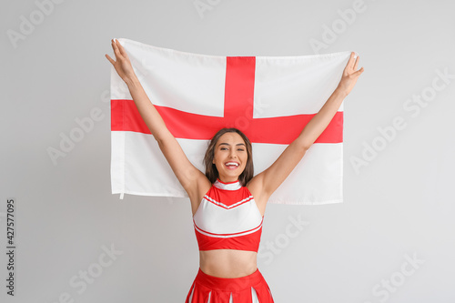Beautiful cheerleader with ...