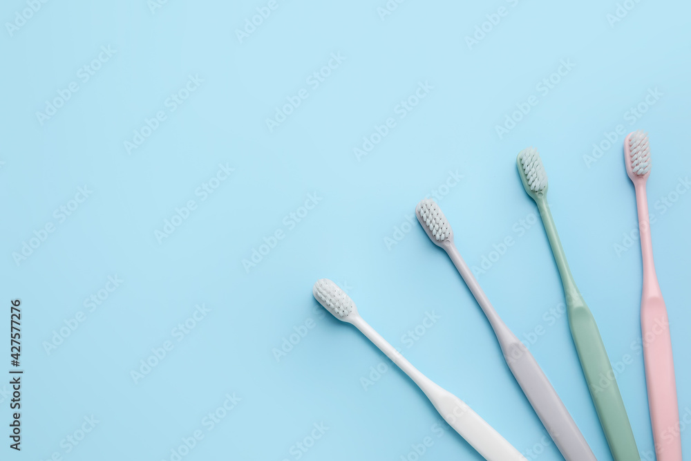 Tooth brushes on color background Tooth brushes on color background