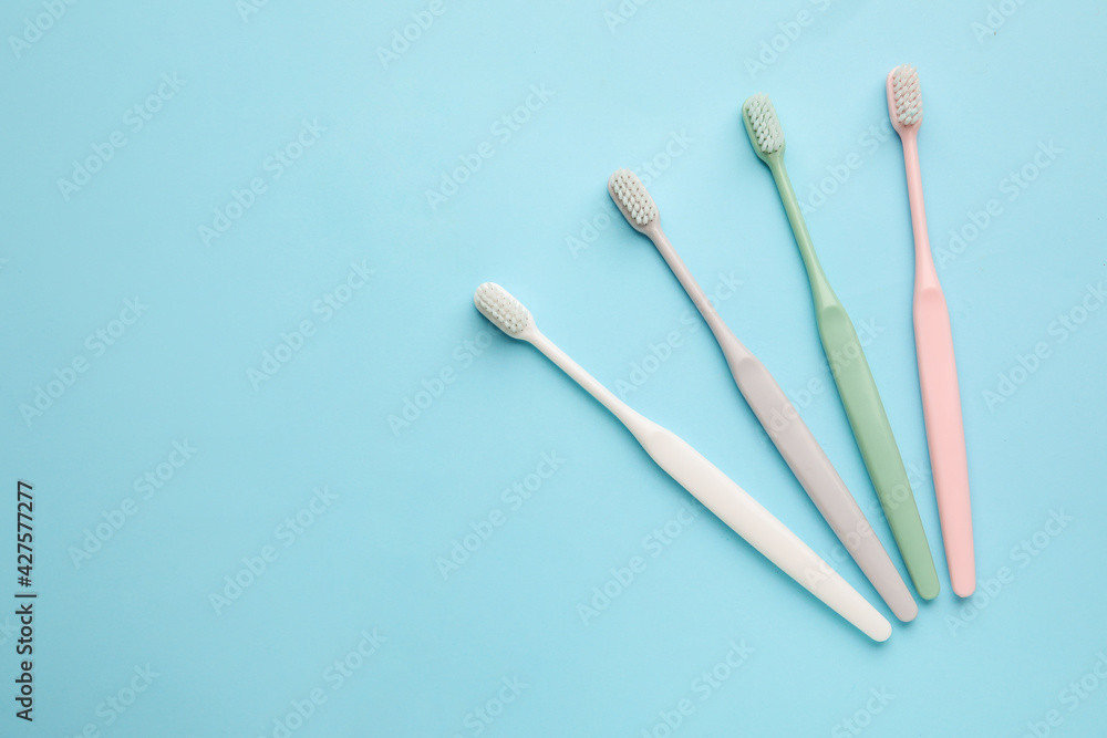 Tooth brushes on color background Tooth brushes on color background