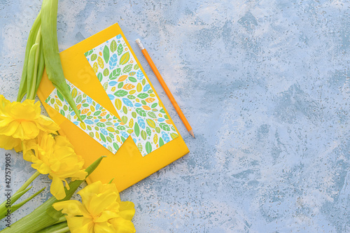 Yellow notebook with leaf p...