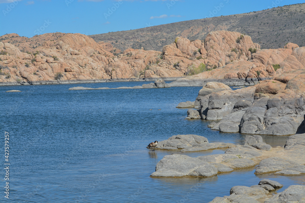 Lake Watson has picturesque, exposed granite bedrock with bright blue water. Located in Prescott, Yavapai County, Arizona 