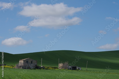 Abandoned farms and wheat fields. Molise, Italy.