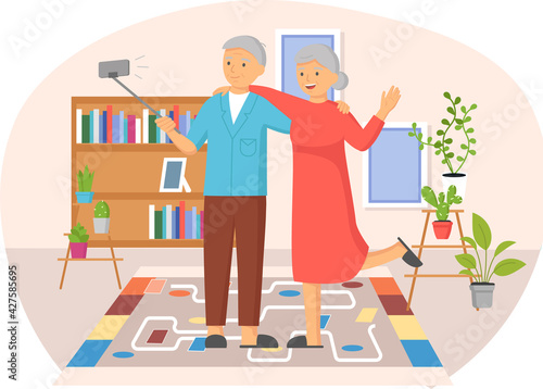 Family with selfie stick, monopod posing for photo at home. Elderly couple takes selfie at home