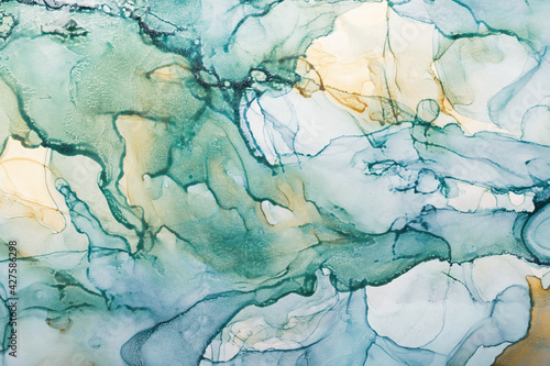 Watercolor alcohol ink swirls. Transparent waves in turquoise green colors. Delicate pastel spots. Digital decor