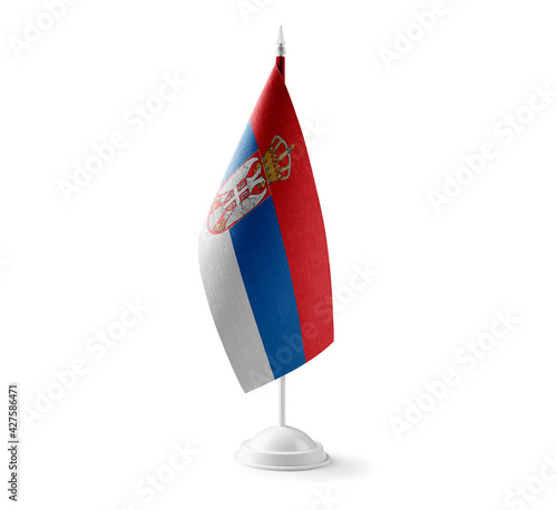 Small national flag of the Serbia on a white background