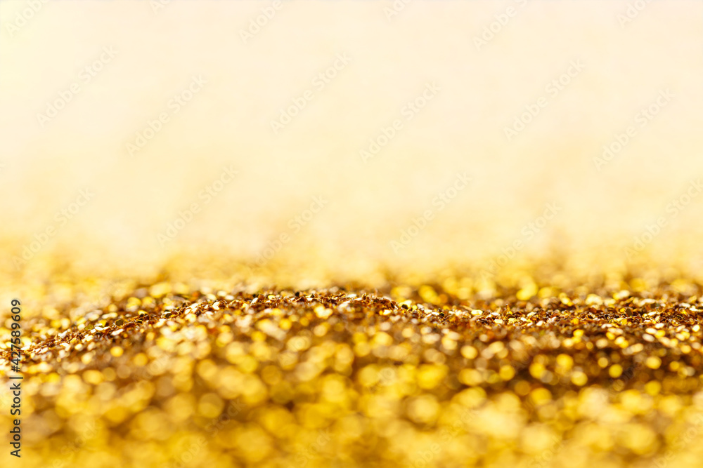 Gold glitter sparkle bokeh light background