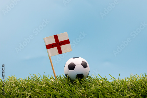 Soccer with England  flag on blue sky background