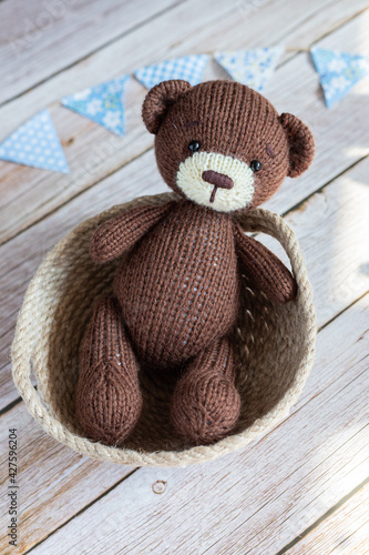 Wallpaper Mural A brown bear in a wicker basket. Torontodigital.ca