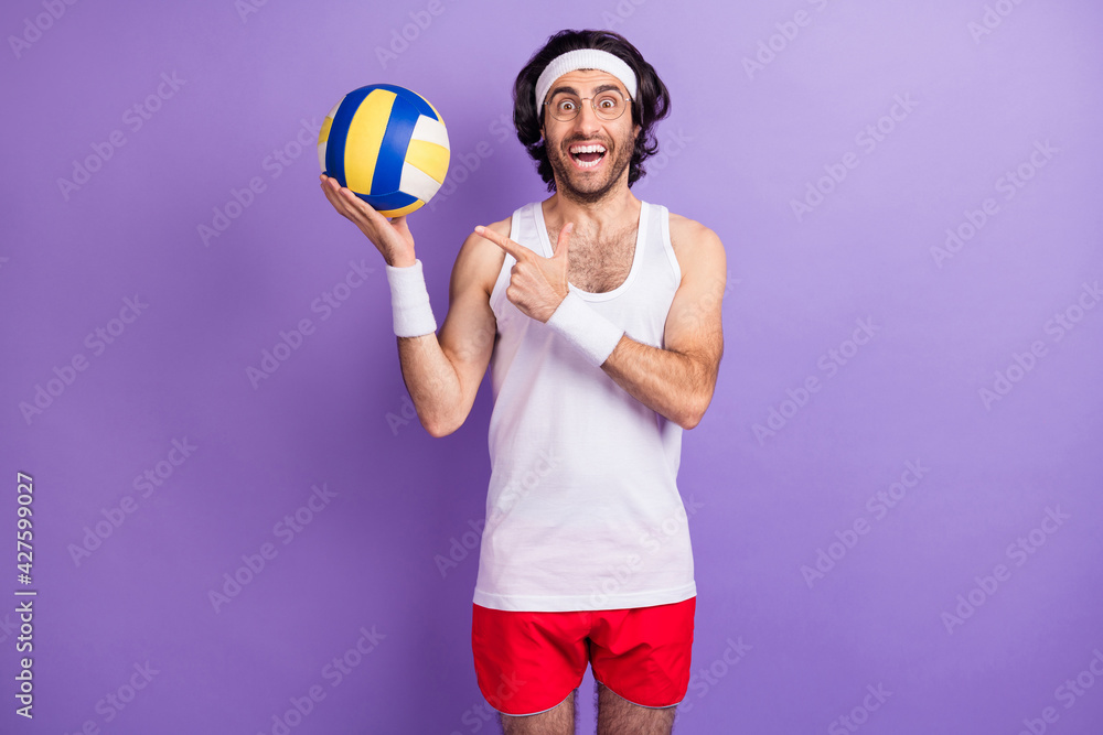 Photo of sportsman hold ball direct finger open mouth wear specs singlet shorts isolated violet background