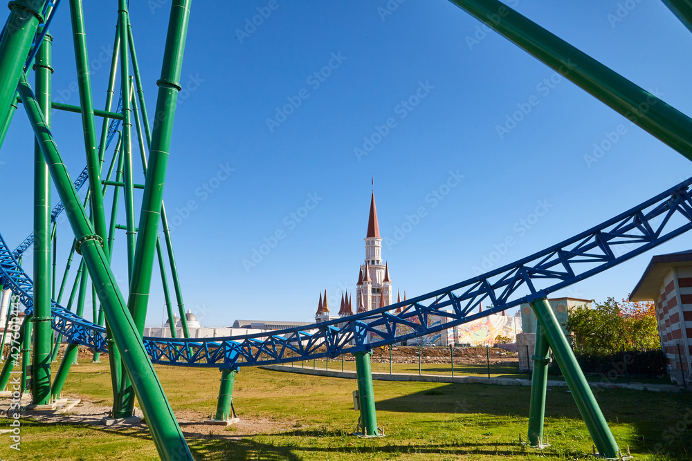 Roller coaster Ride against blue sky in a nice day. Roller coaster Ride against blue sky in a nice day.