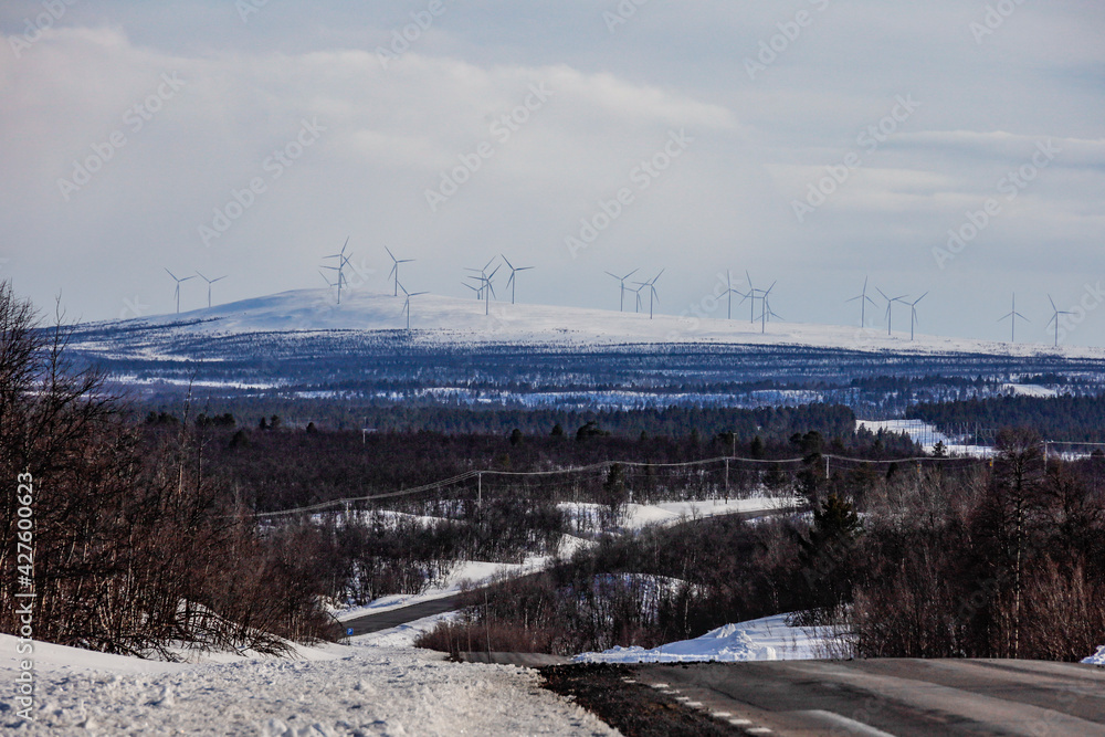 Kiruna, Sweden A landscape outside Kiruna with wind turbines.