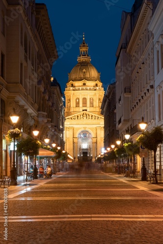 Budapest historical city center, picturesque streets to Saint Stephen basilica in Budapest, Hungary night time blue hour. 