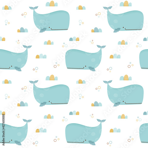 Seamless pattern with cute and whimsical whale in pastel colors. Summery pattern with cartoon whale and ocean theme.