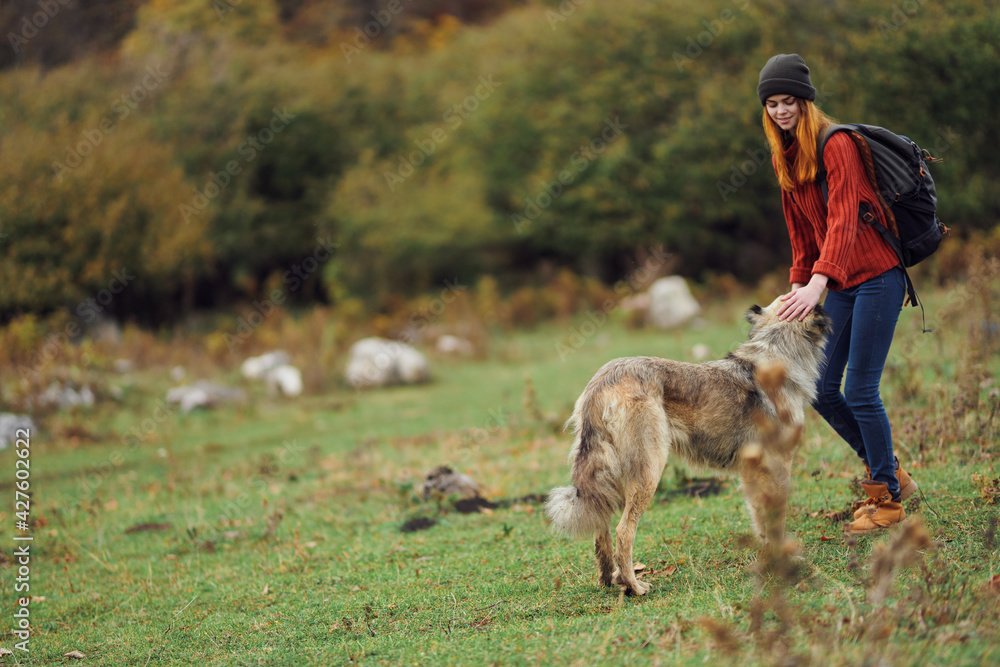 woman tourist with dog walking in nature travel pass freedom of adventure woman tourist with dog walking in nature travel pass freedom of adventure