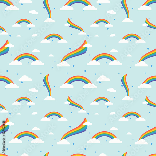 Seamless pattern. Rainbow. Rainbow background. Vector illustration. Stock vector. White cloud. Blue background. © Алина Ермохина