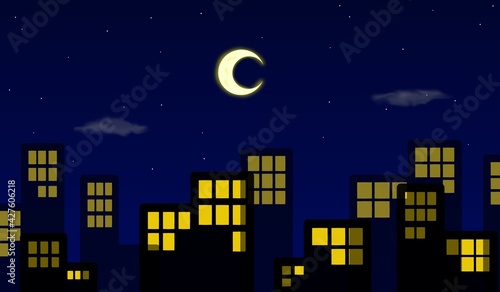 City in the middle of the night of the crescent moon