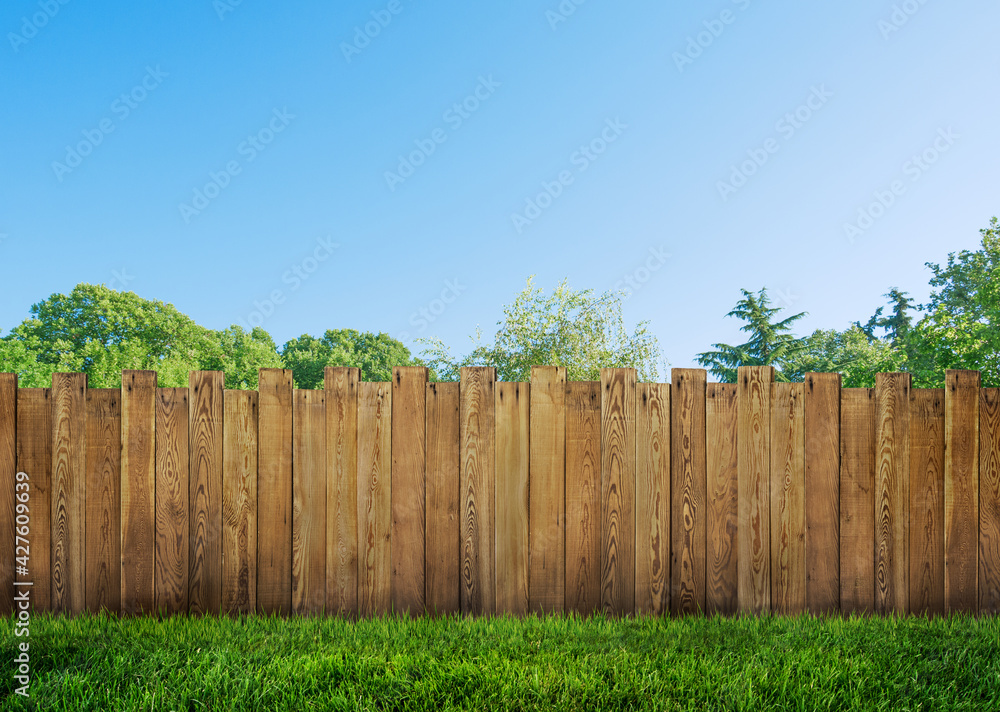 wooden garden fence at backyard and trees wooden garden fence at backyard and trees