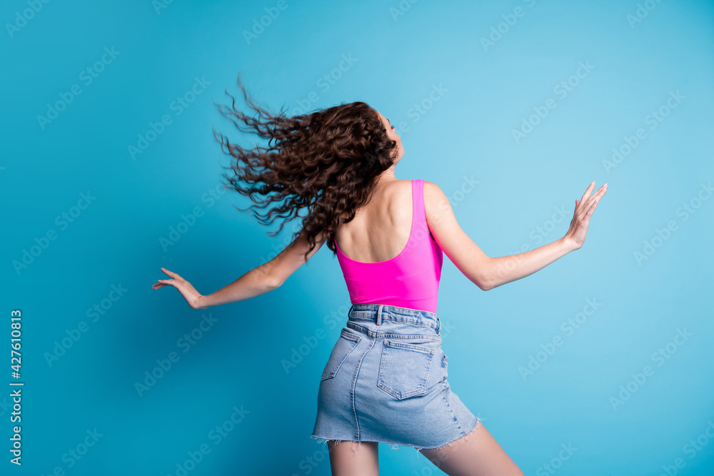 Naklejka premium Back rear view photo of young girl anonym enjoy hair care treatment isolated over blue color background
