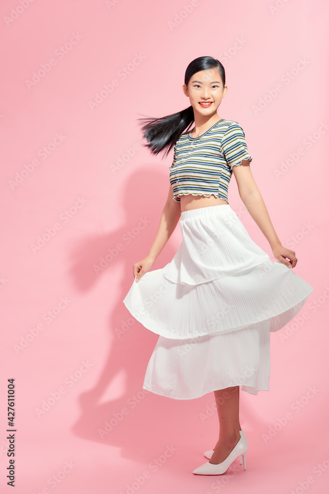 Pretty girl spinning some motion blur in her skirt Pretty girl spinning some motion blur in her skirt