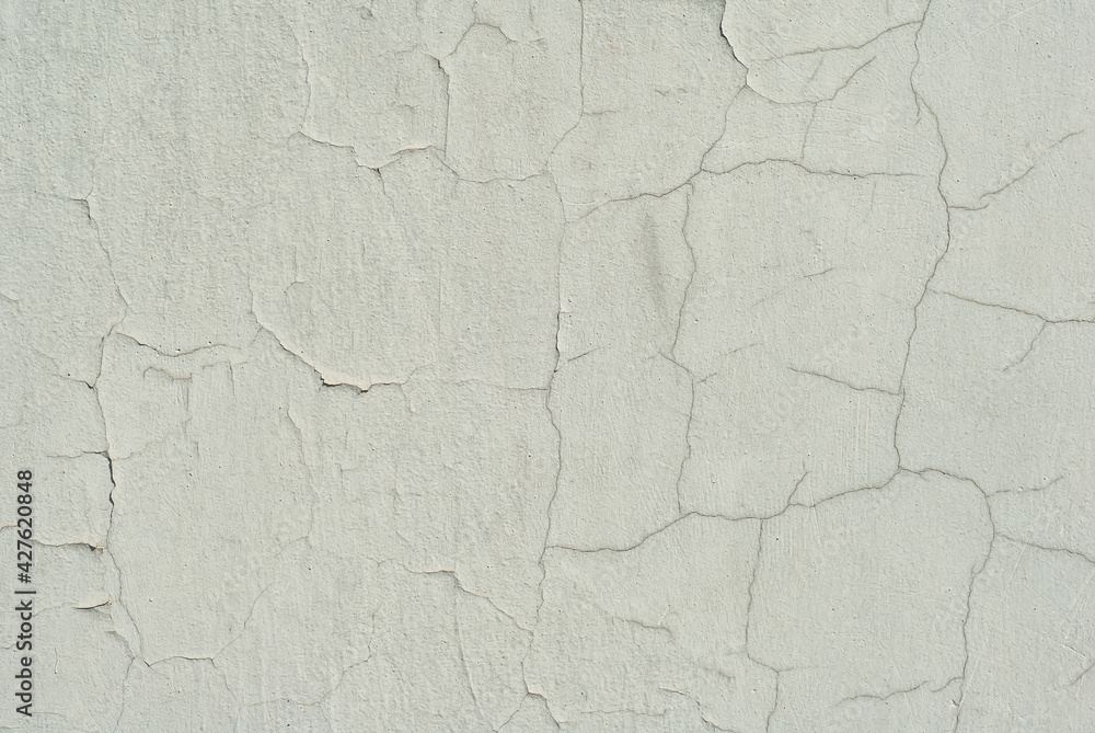 Fototapeta premium Plaster on a green wall. Concrete wall texture close up.