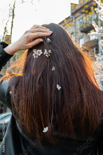 photo of a girl with the cherry blossoms in her hair © Max Bonda